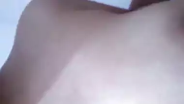Indian girl exposing and playing with her boobies