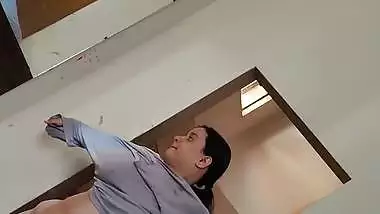 Chubby wife wearing dress after nude bath caught