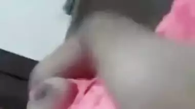 Desi cutie in pink actively XXX fingers her wet pussy on the bed