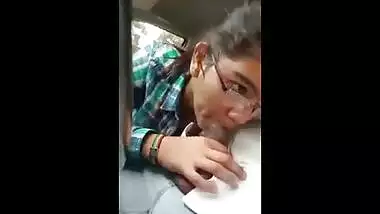 Indian porn mms of a slutty teen giving a blowjob to lover in his car